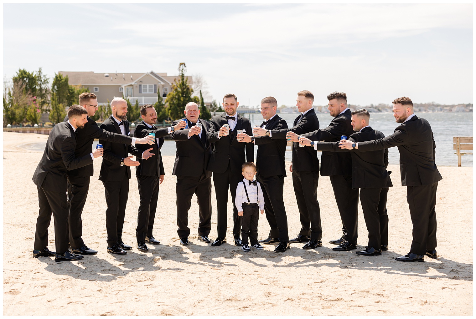 groom celebrating with his groomsmen