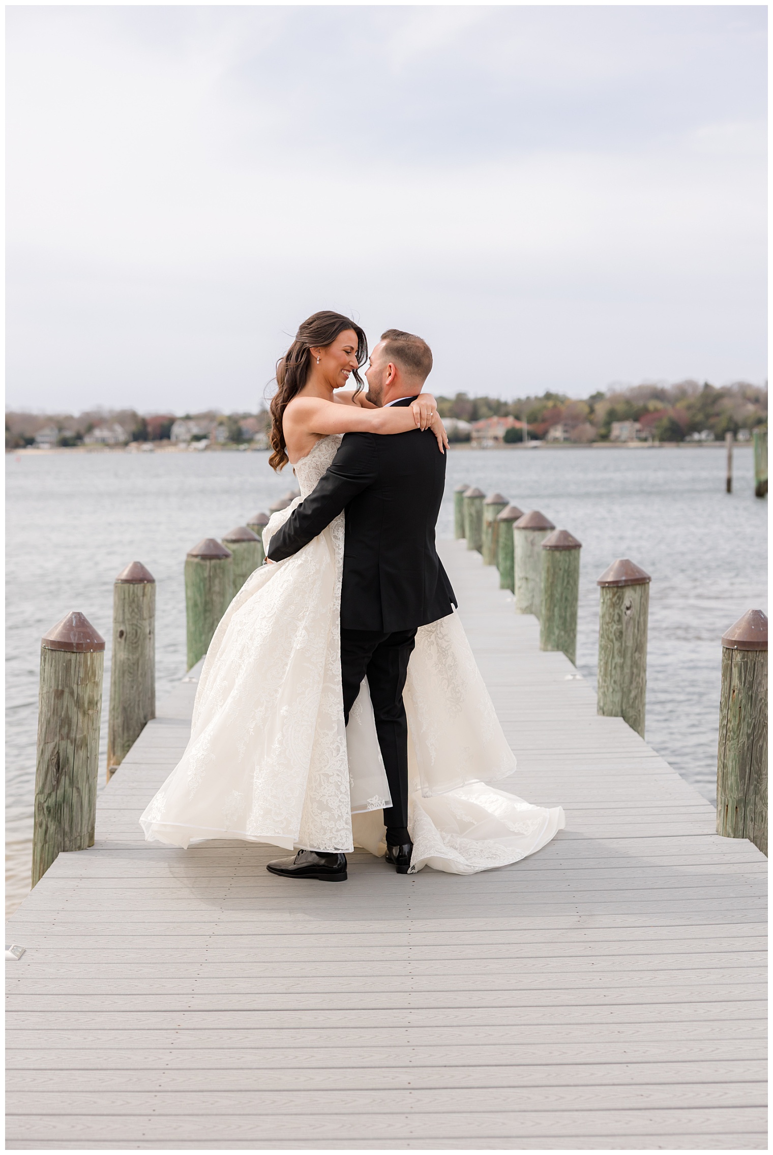 bride and groom hugging
