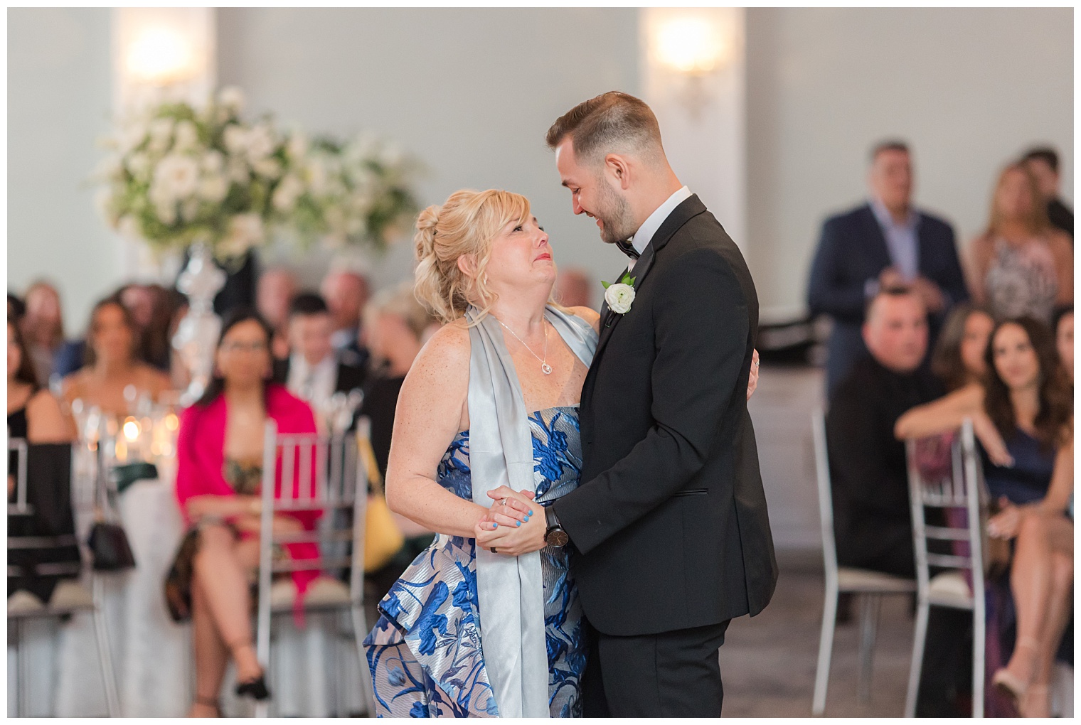 groom dancing with his mother