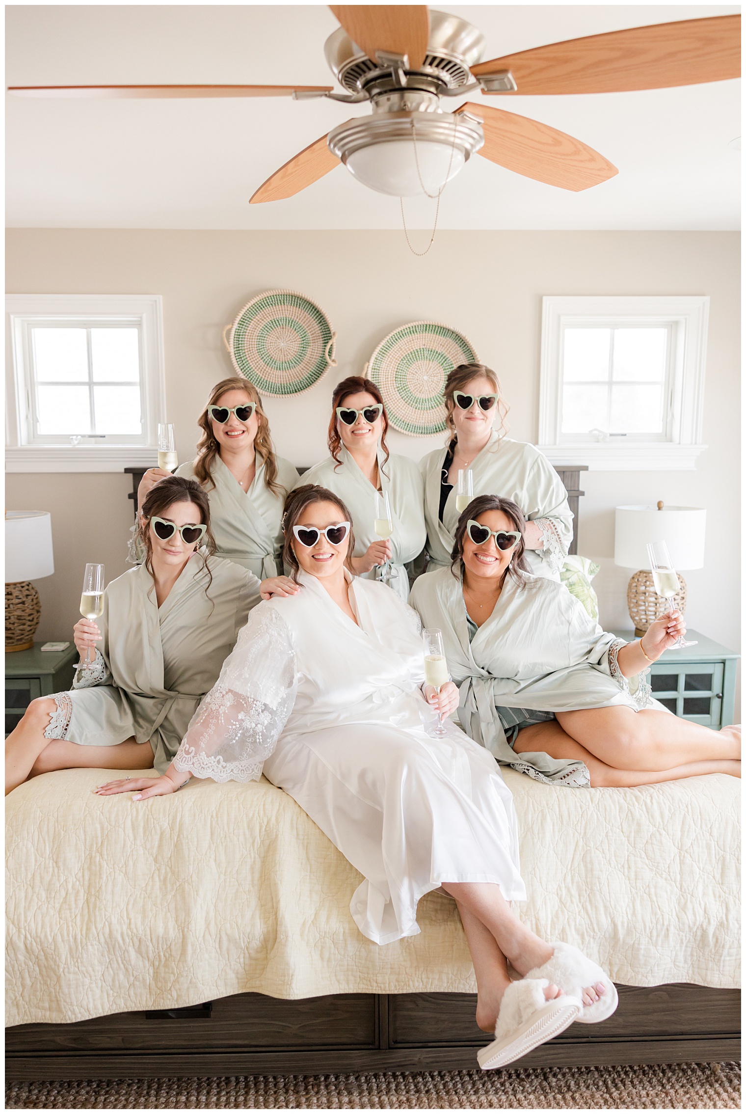 bride and bridesmaids wearing heart-shaped sunglasses 