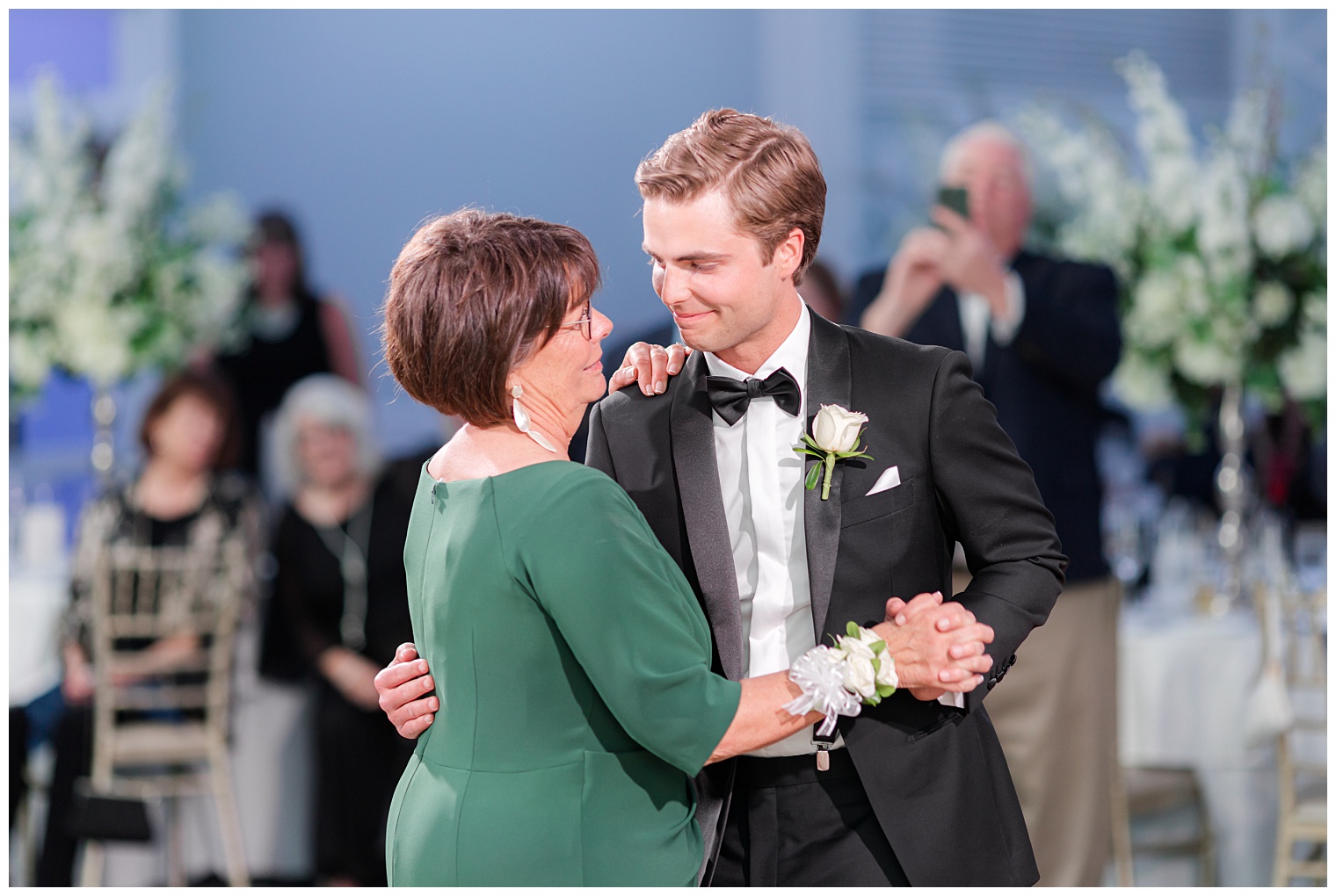groom dancing with his mother