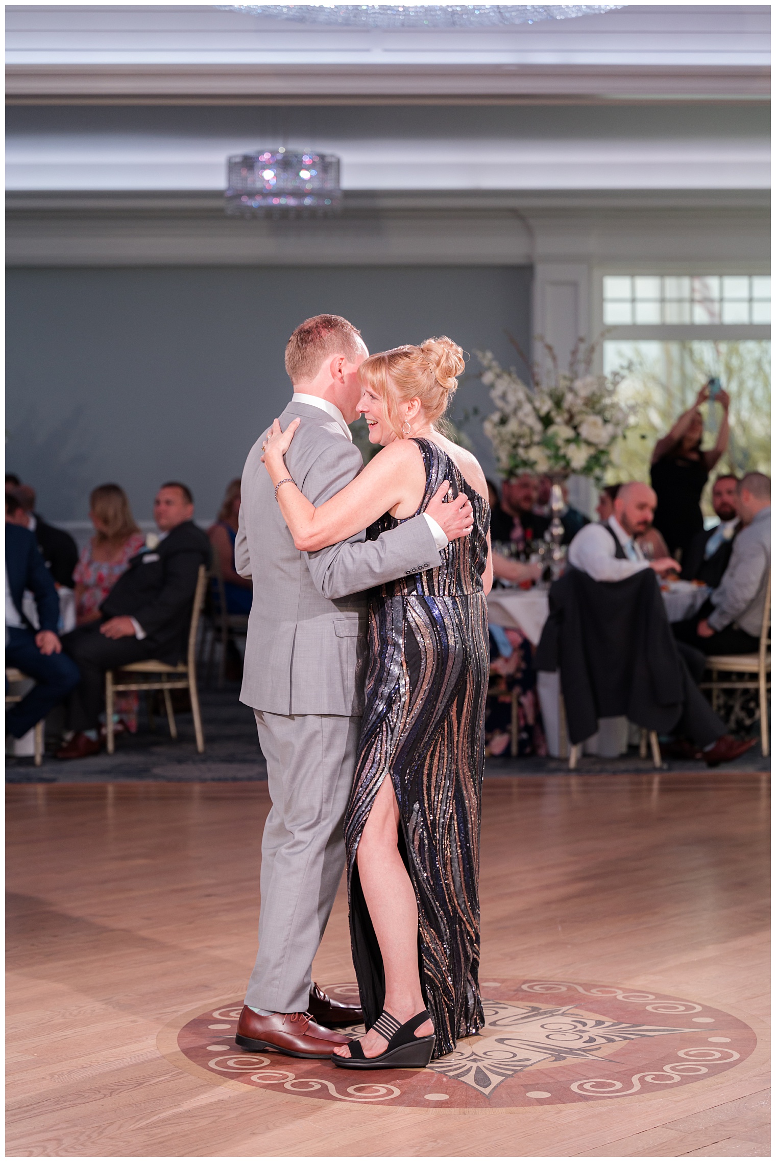 groom dancing with his mother