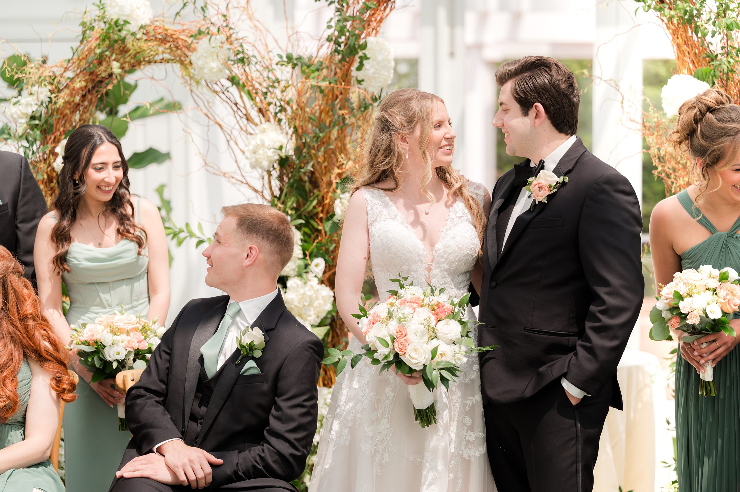 Wedding party looking at each other