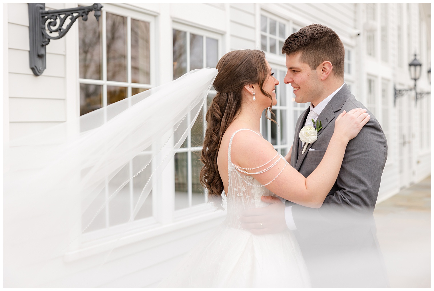 bride and groom looking at each other